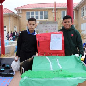 Students with project super paper football